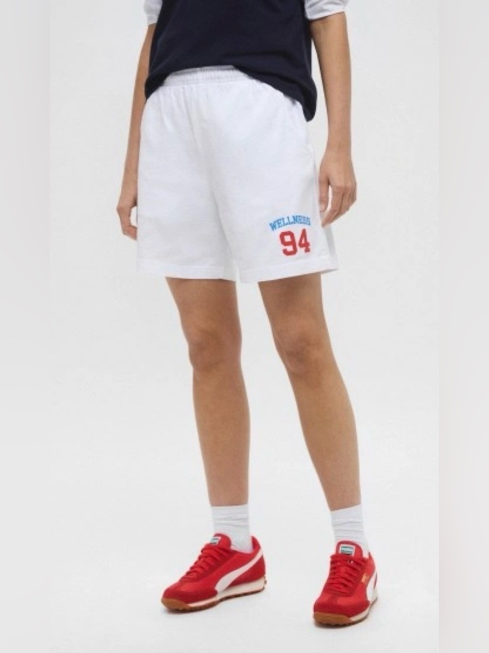 Sporty & Rich White Wellness 94' Athletic Shorts with Red & Blue Logo Unisex